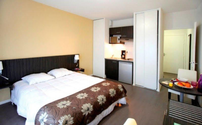 Park And Suites Confort Toulouse Lhers Esterno foto