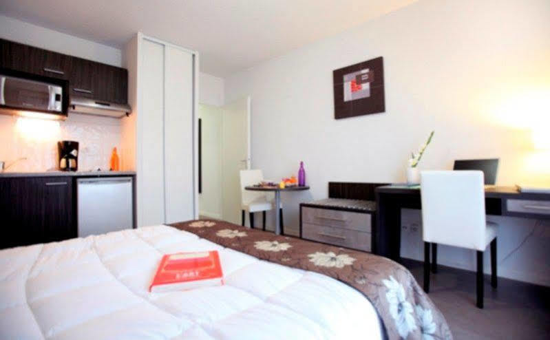 Park And Suites Confort Toulouse Lhers Esterno foto